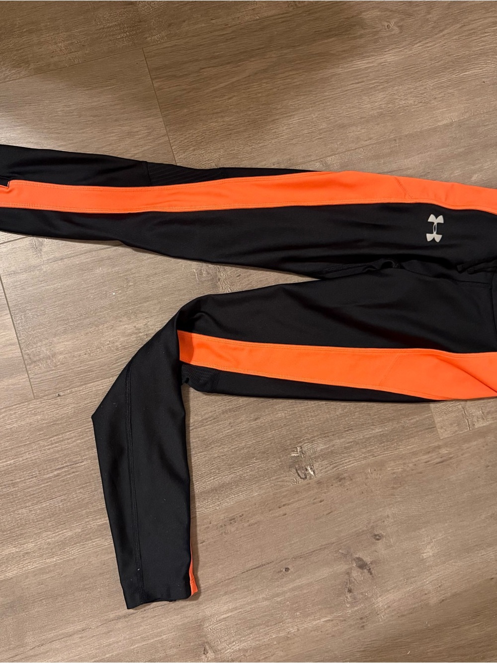 Under Armour Ladies Black Leggings with Orange Side Stripe